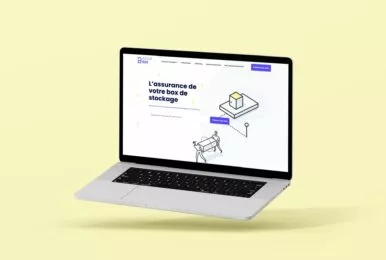 Ordinateur affichant le site de Assurbox