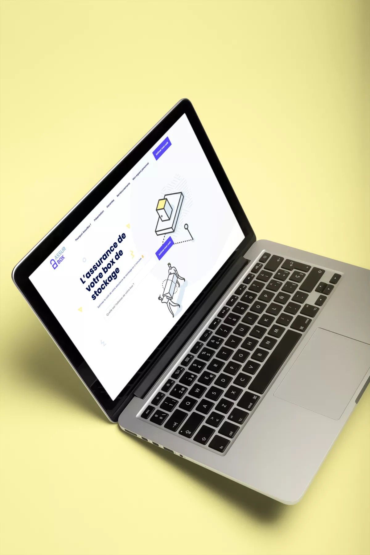 Ordinateur affichant la page d'accueil du site de Assurbox